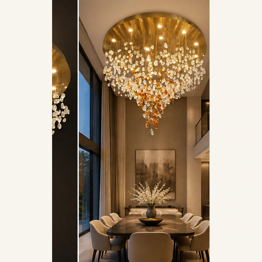 Glass cascade chandelier in a double-height dining room