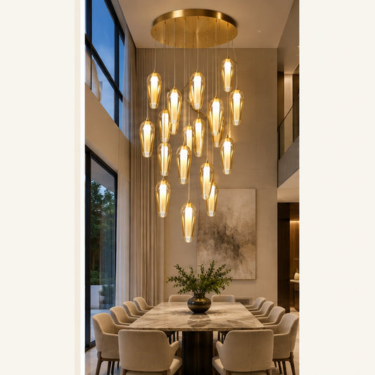 Gold amber capsule cluster above a dining table