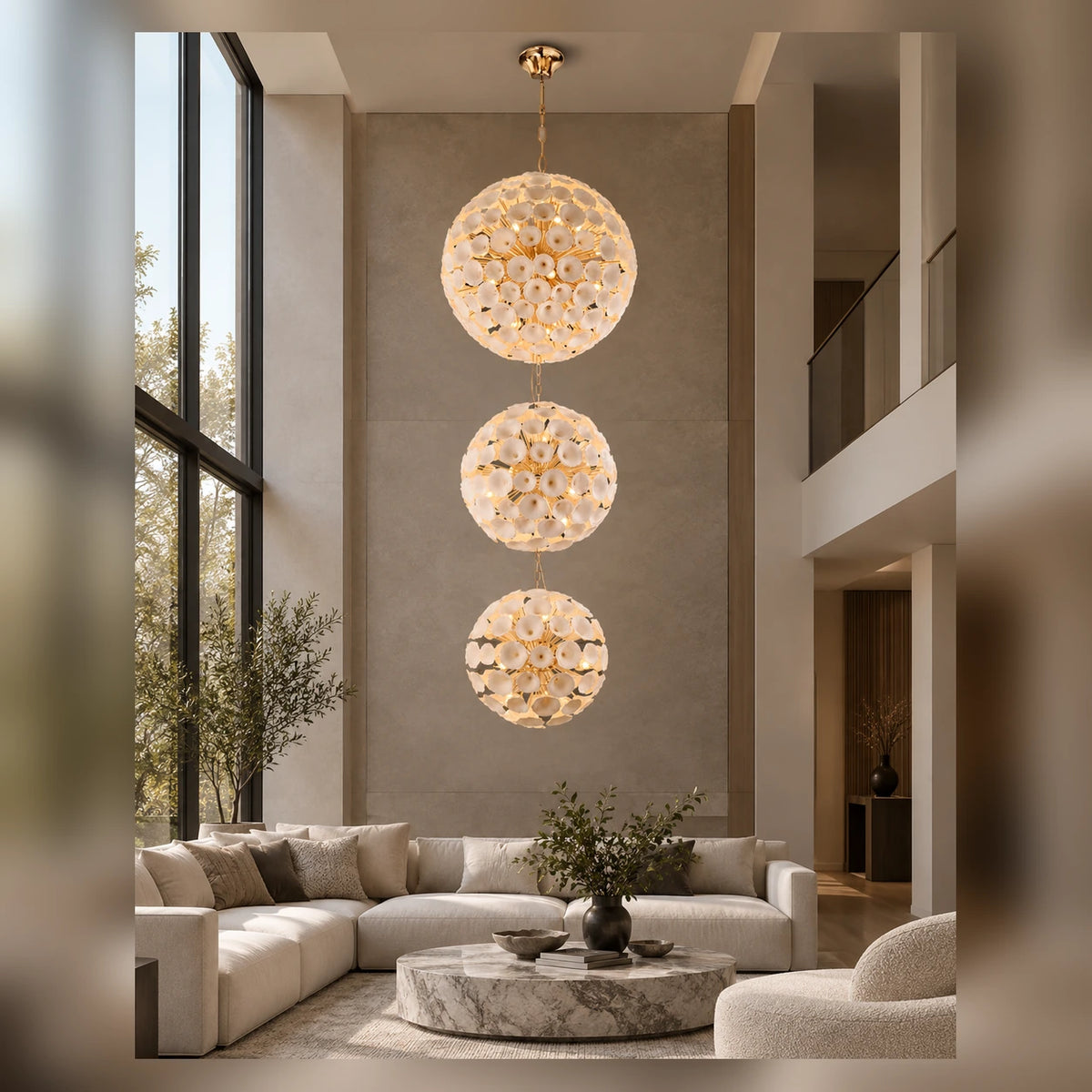 Three-tier ceramic flower chandelier in a spacious double-height living room
