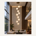 Ten-disc marble cascade chandelier in a double-height living room