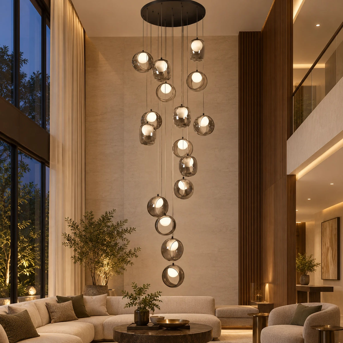 Cascading smoke glass chandelier in a double-height living room