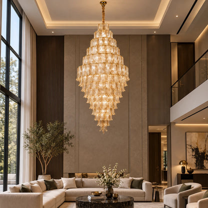 Tiered ribbed glass cascade chandelier in a double-height living room