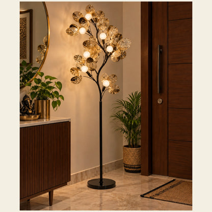 Branching globe floor lamp in an entrance corner