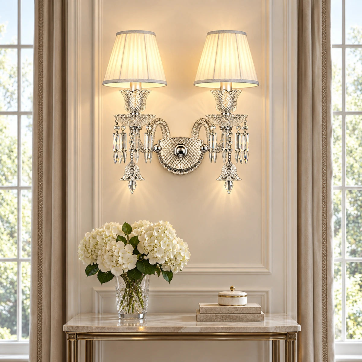 Double-shade crystal wall sconce between tall living-room windows