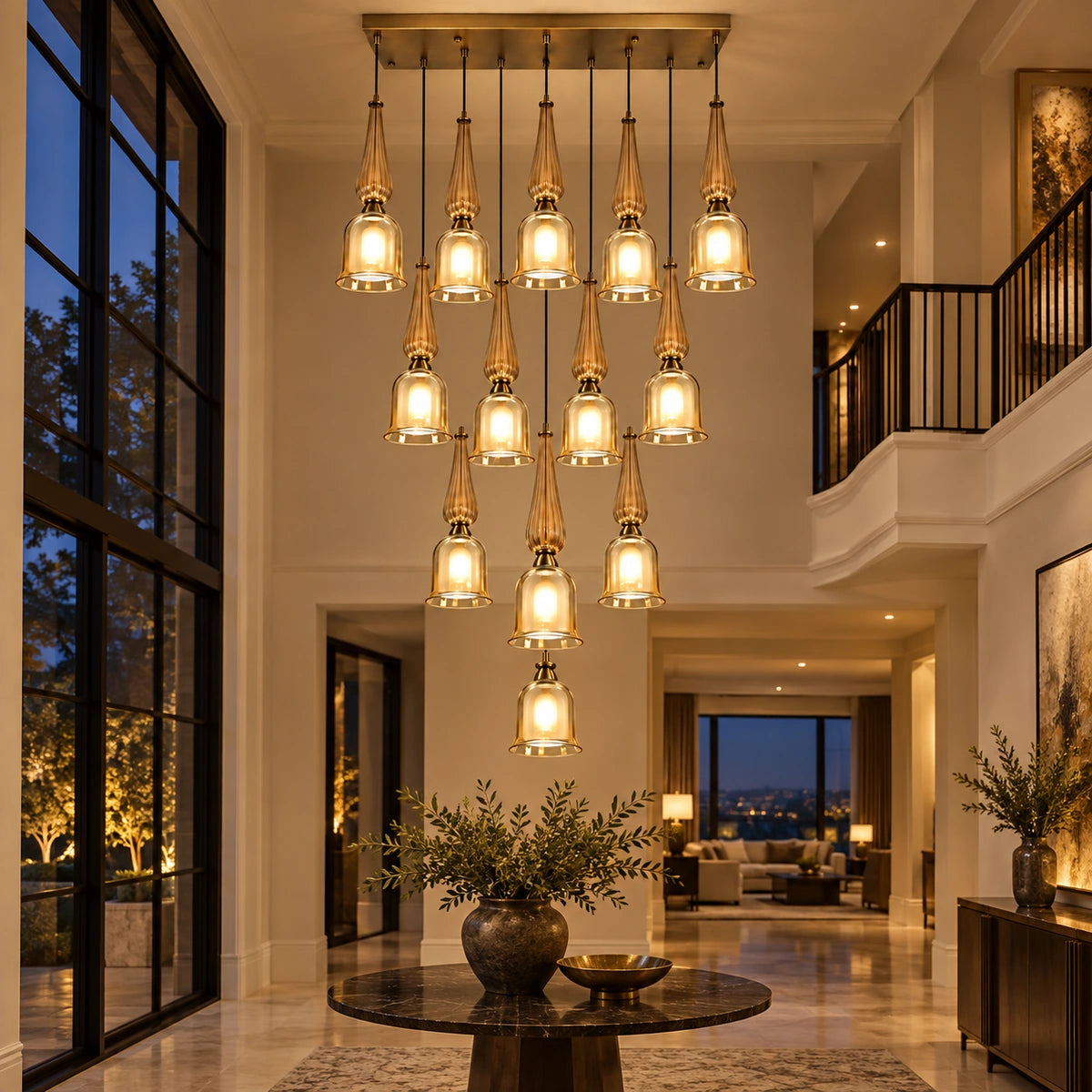 Thirteen-light amber glass cascade chandelier in a double-height foyer