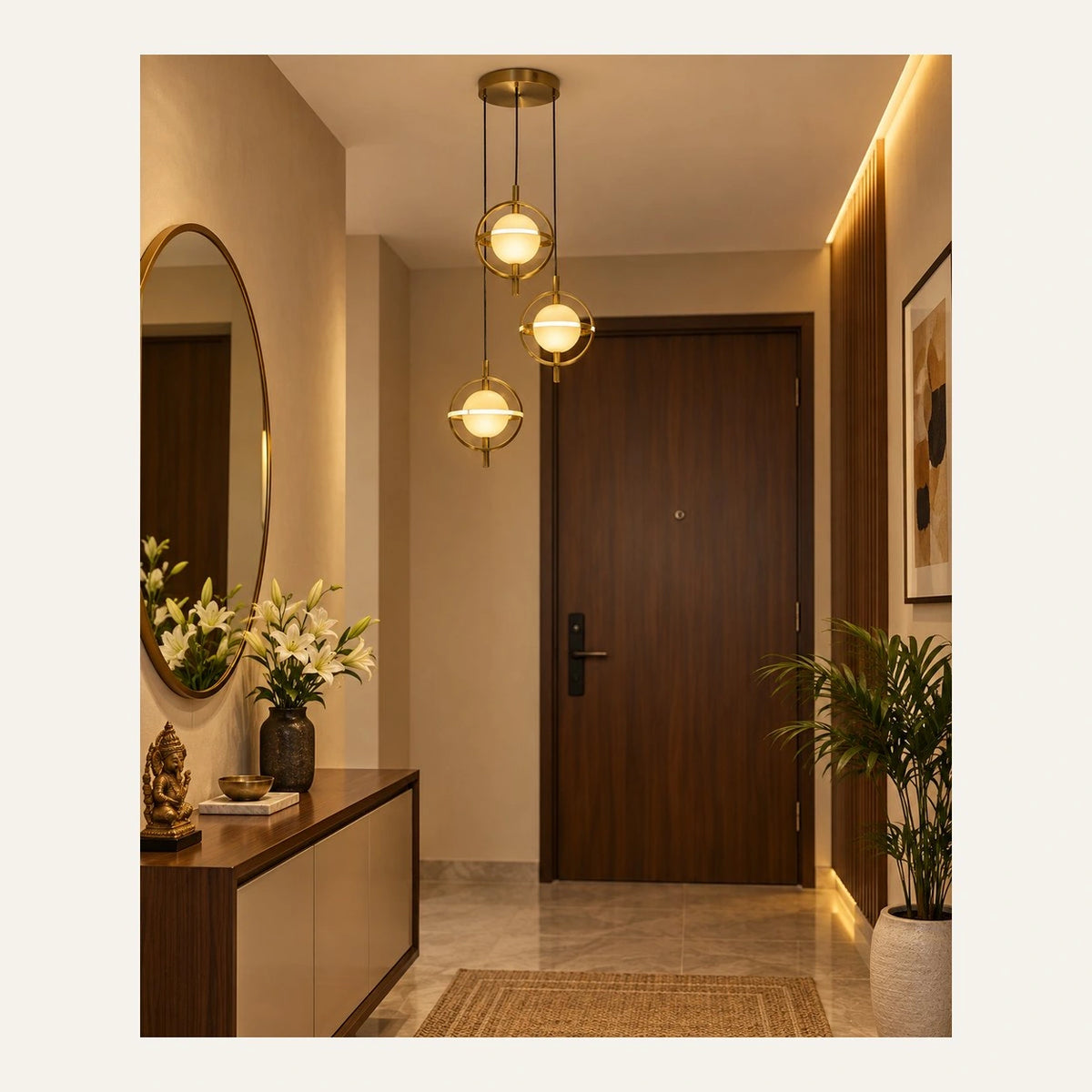Three-globe ring cluster pendant in an entrance foyer
