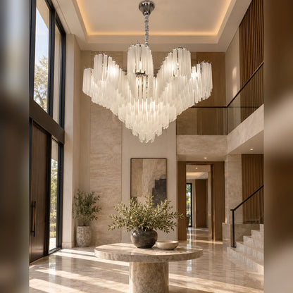 Frosted tiered chandelier in an entrance foyer