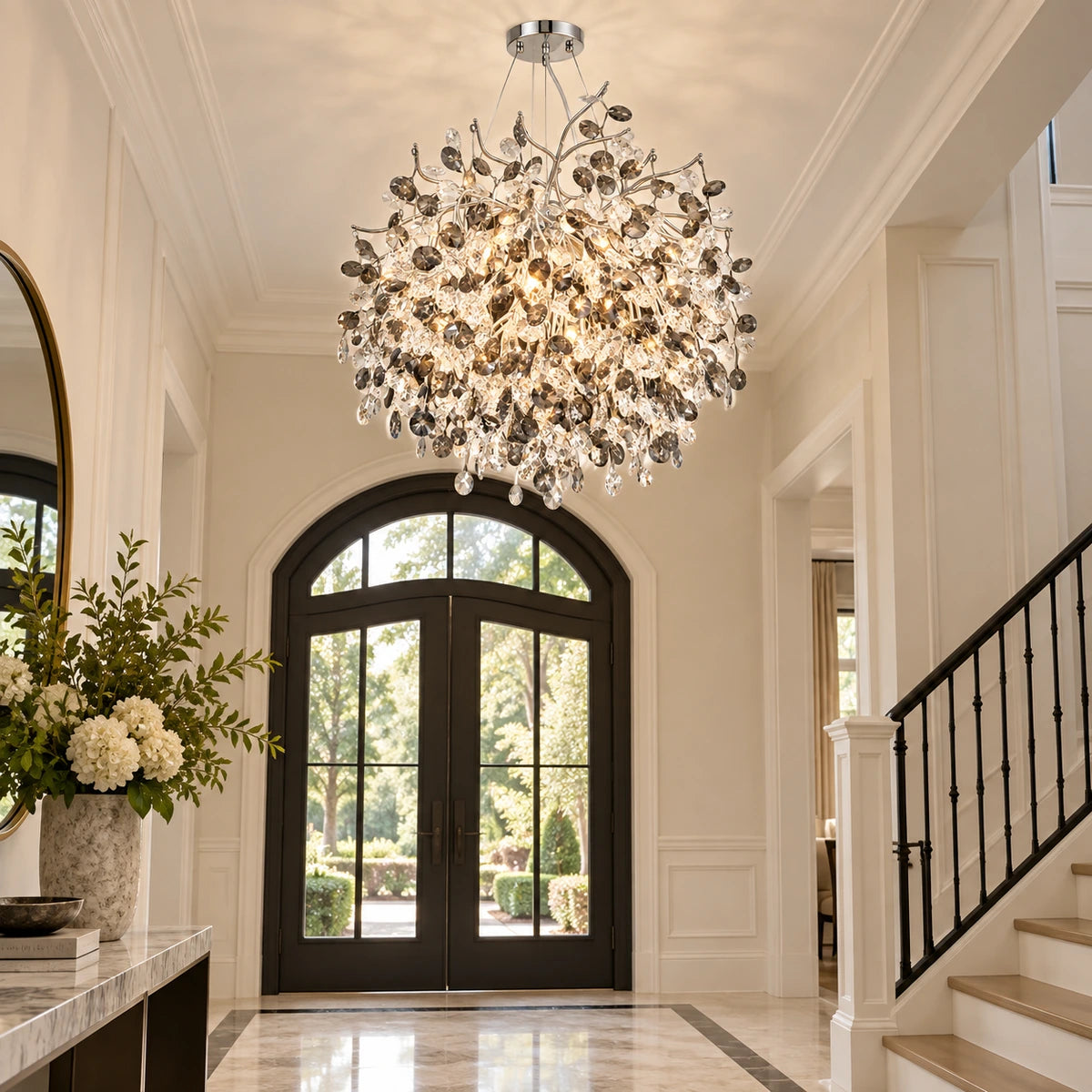 Silver botanical crystal chandelier in an entrance foyer
