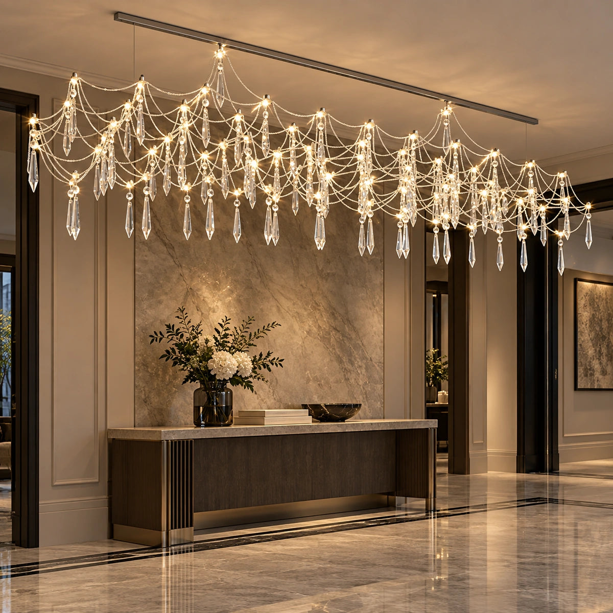 Chrome crystal draped chandelier in a foyer