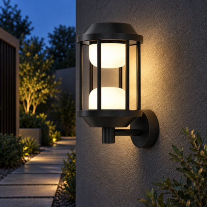 Twin-glow cage wall light along a sheltered garden walkway
