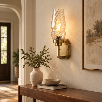Sculpted ripple-shade wall sconce above a hallway console