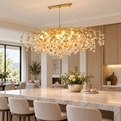 Grand botanical crystal chandelier above a kitchen island