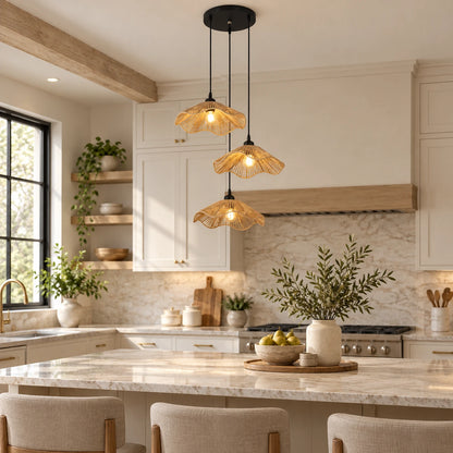 Lotus weave three-light pendant cluster above a kitchen island