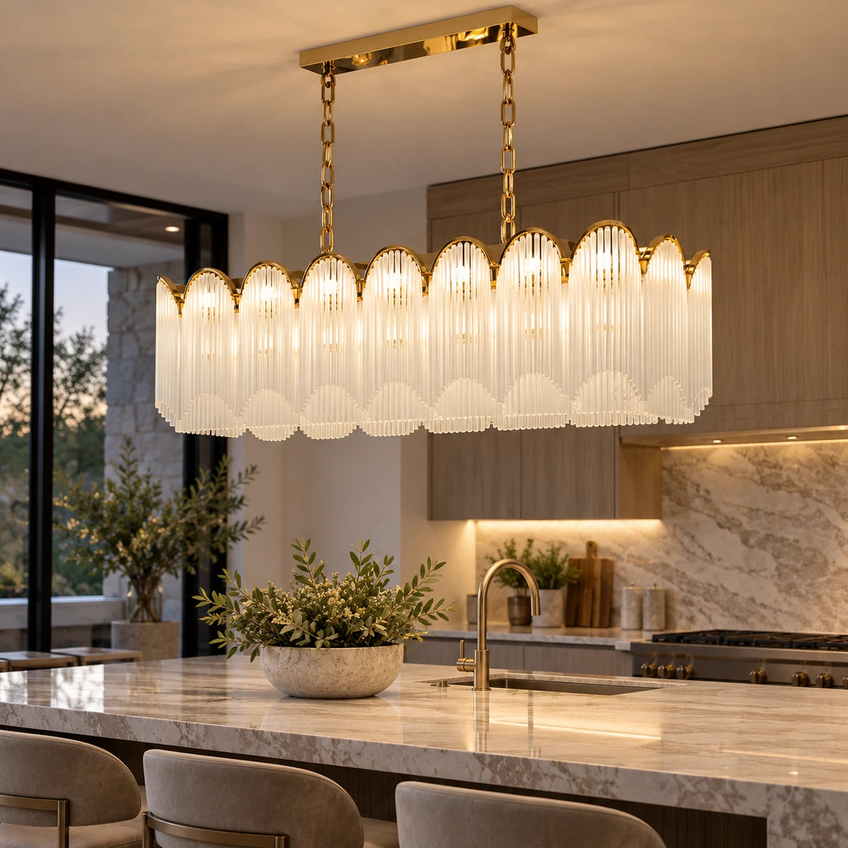 Scalloped frosted-glass chandelier above a kitchen island