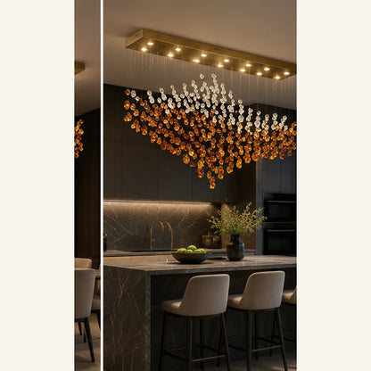 Crystal wave linear chandelier above a kitchen island