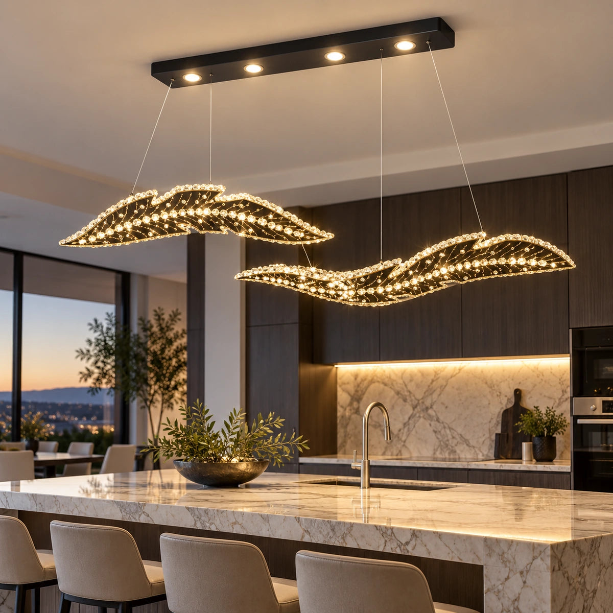 Twin-wave crystal chandelier above a kitchen island