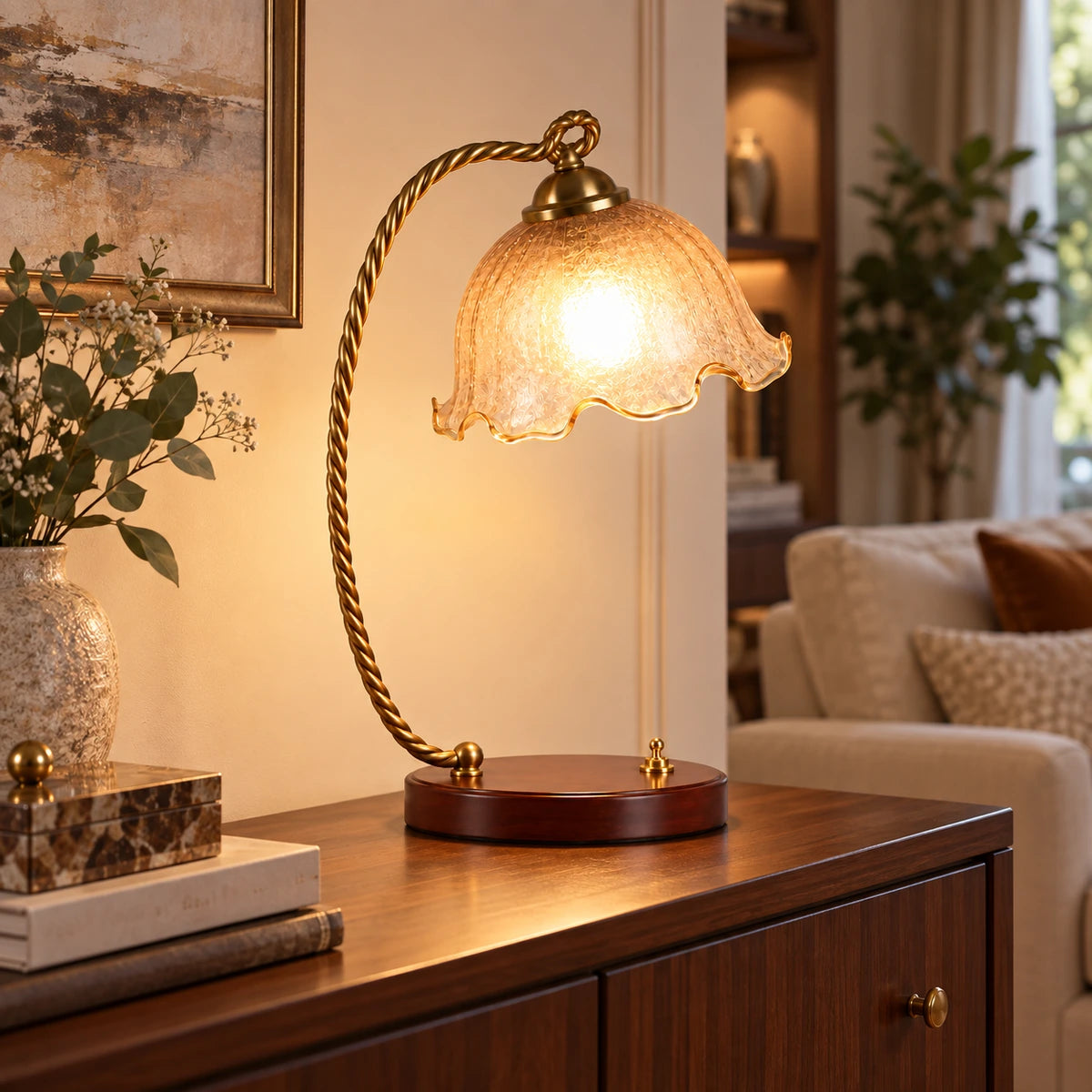 Amber tulip table lamp on a living room console