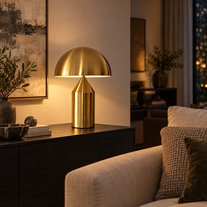 Antique-gold dome table lamp on a living-room console