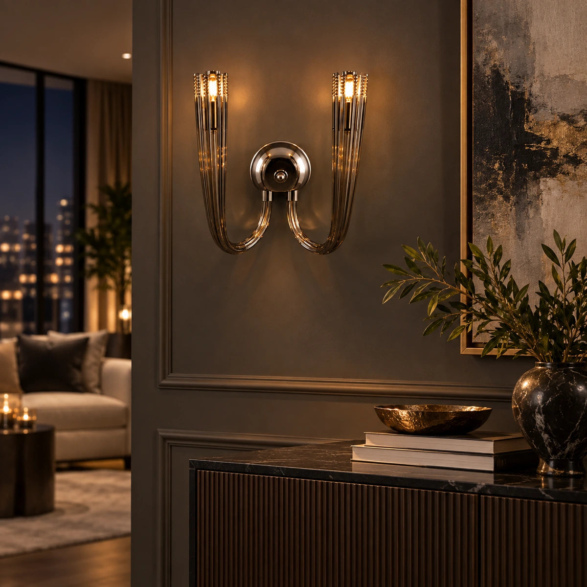 Twin-arm smoked-glass wall sconce above a living-room console