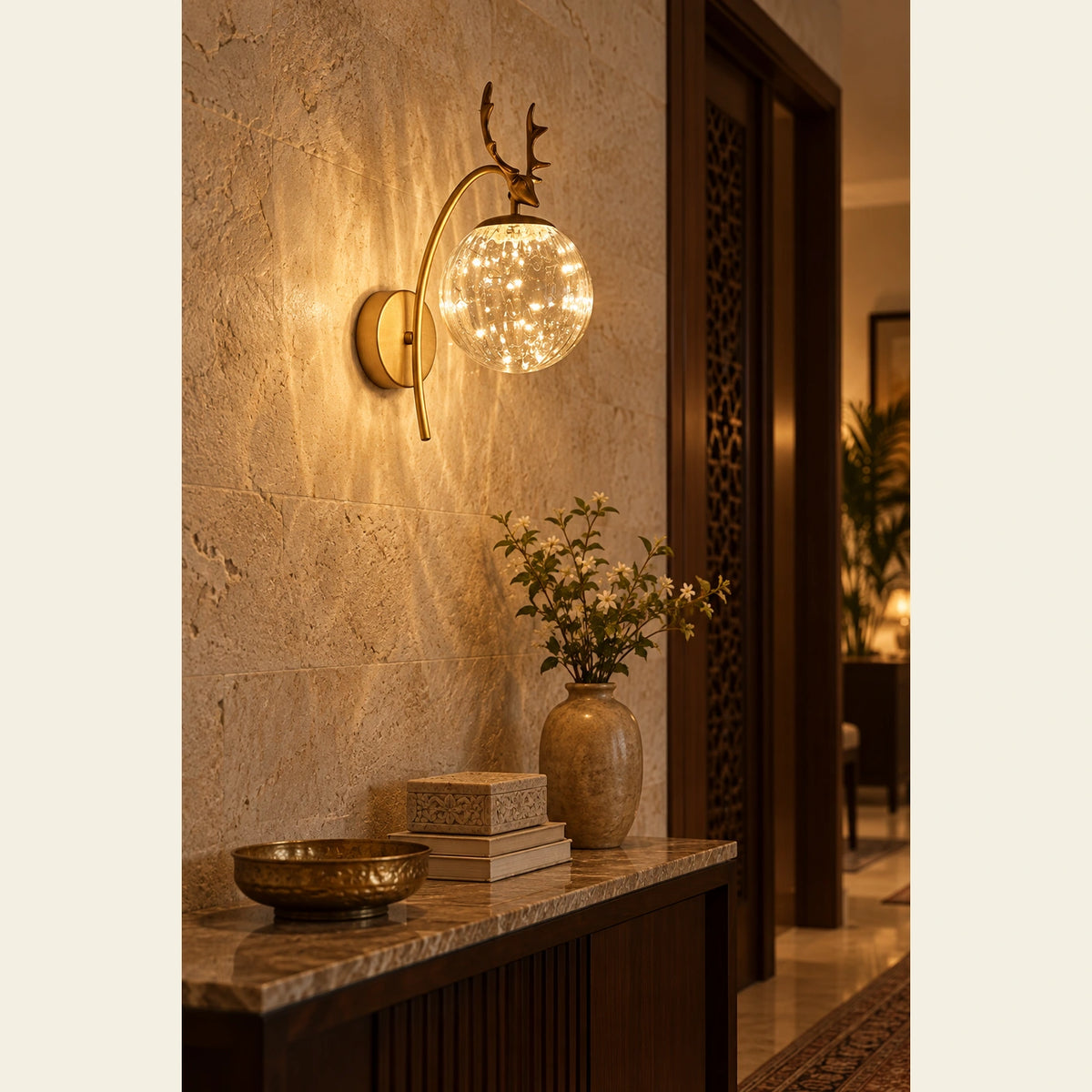 Antler bubble-globe wall sconce in an entrance corner