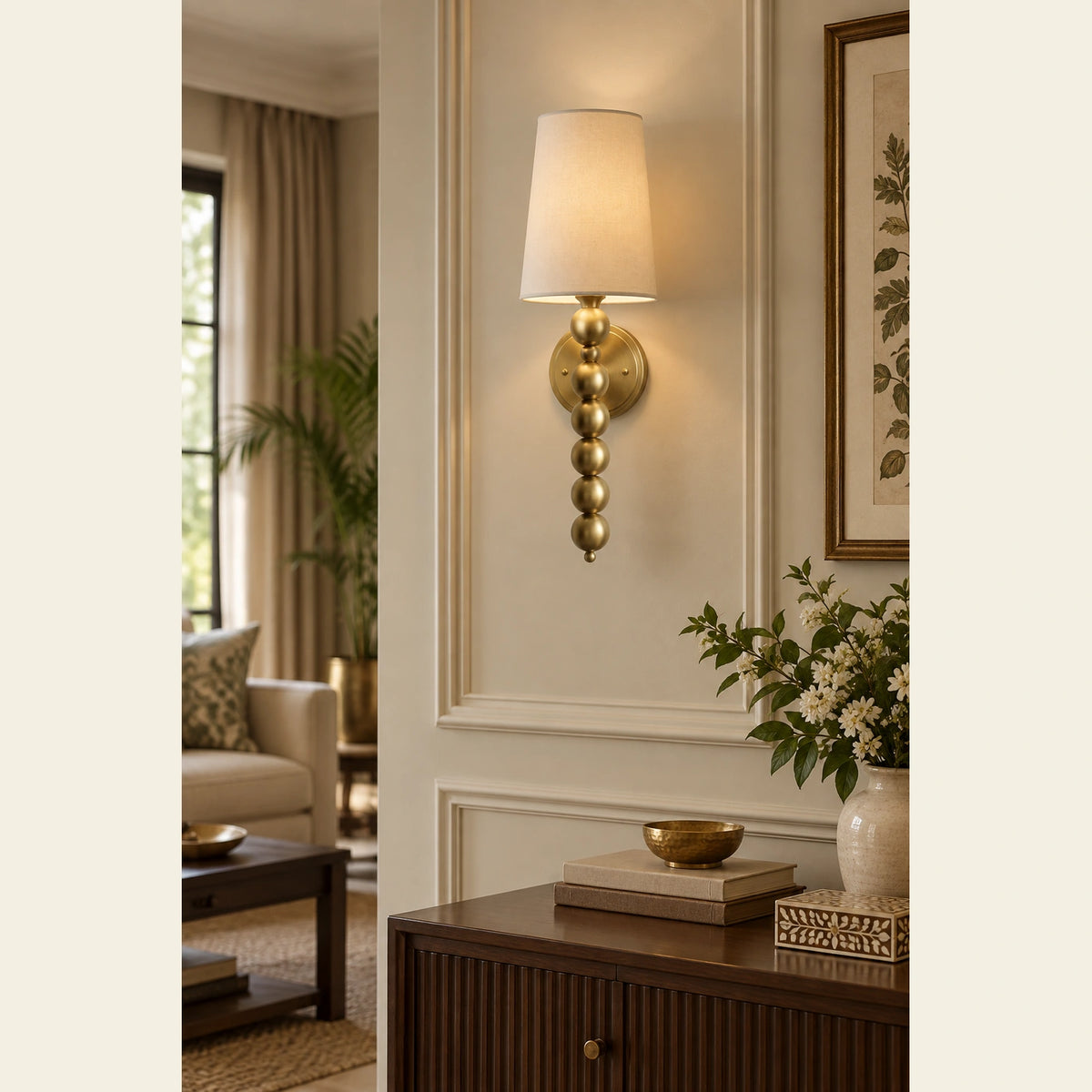 Beaded-stem shaded wall sconce in a living room