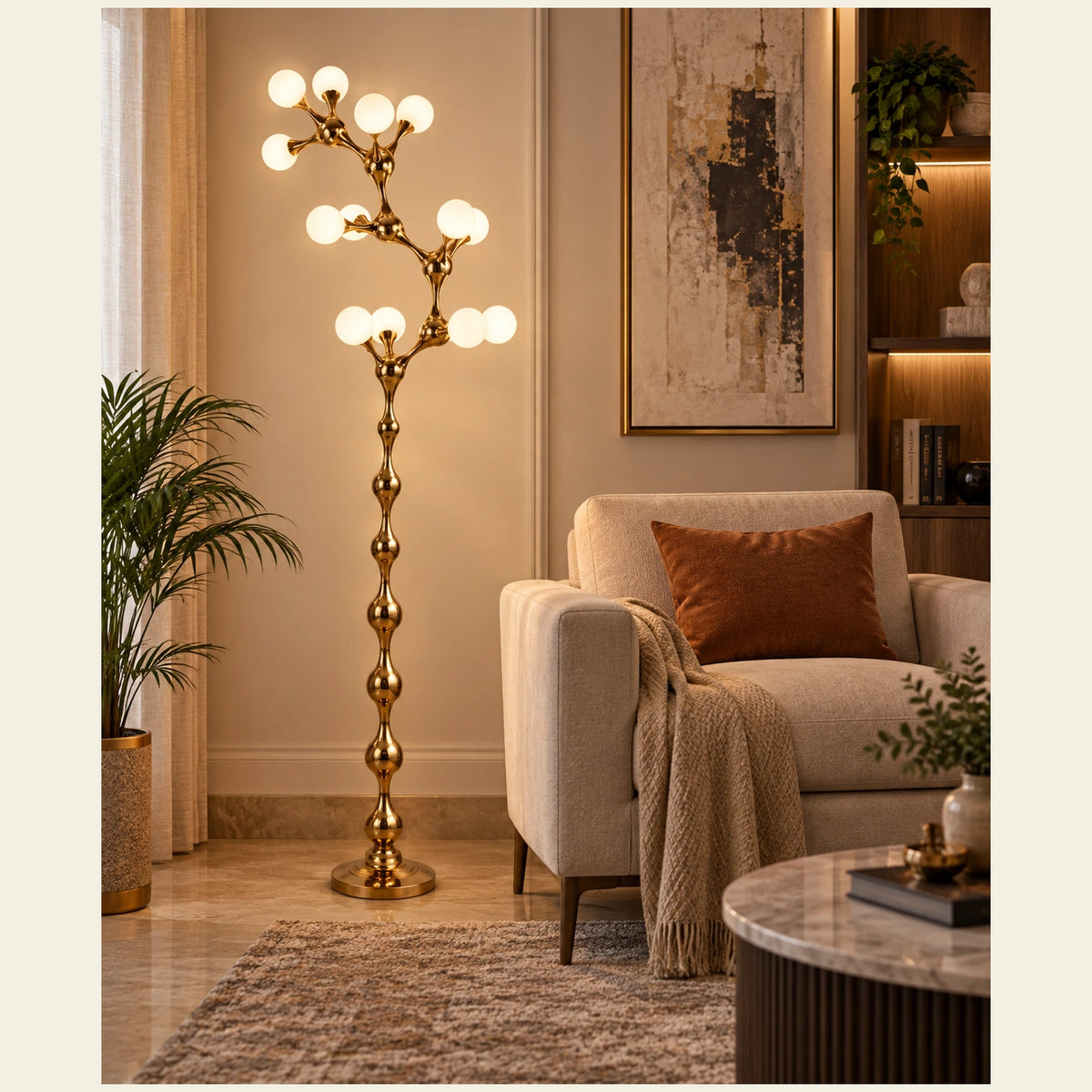 Sculptural vine floor lamp beside a living-room armchair