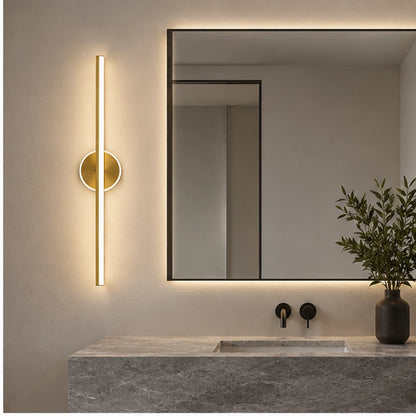 Geometric linear wall light above a mirror