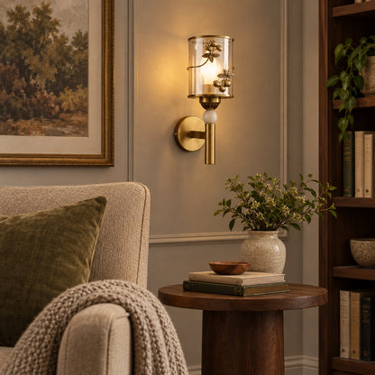 Botanical cylinder wall sconce in a reading corner