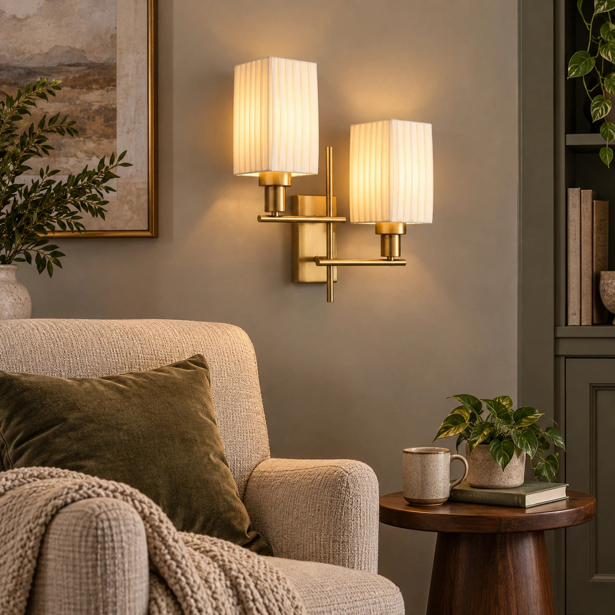 Twin pleated shade wall sconce in a reading corner