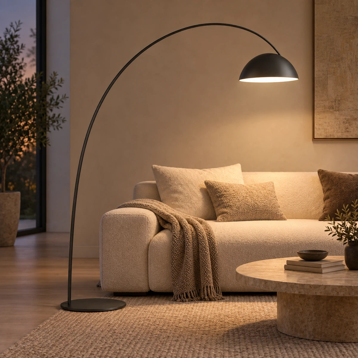 Arc floor lamp beside a neutral sofa