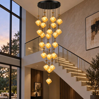 Amber glass twenty-two-light cluster chandelier beside a staircase