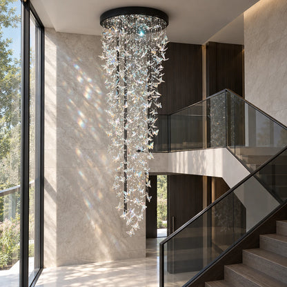 Cascading butterfly crystal chandelier in a stairwell atrium