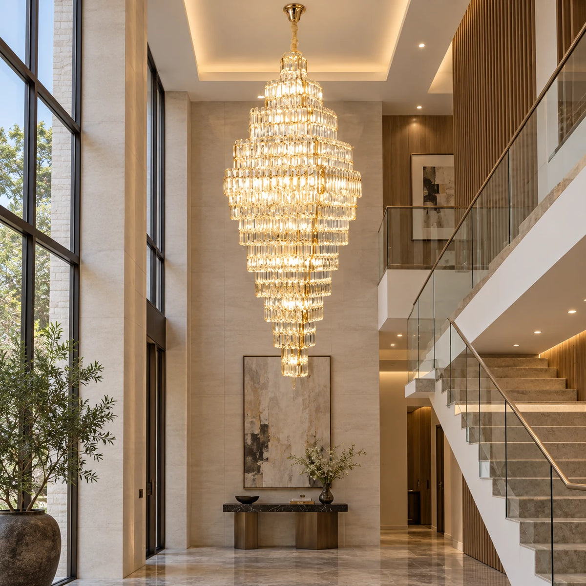 Grand vertical crystal cascade chandelier in a stairwell atrium