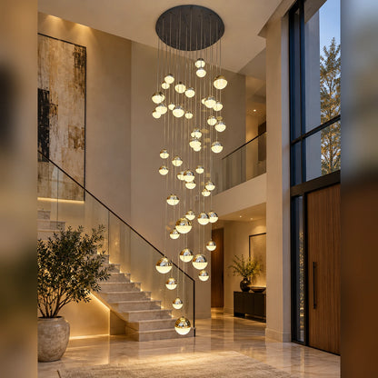 Cascading globe chandelier in a double-height stairwell