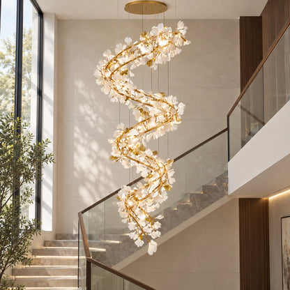 Spiral white leaf chandelier in a stairwell void