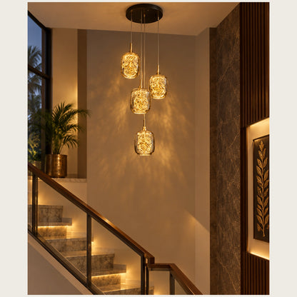 Four-light amber glass cluster pendant in a stairwell