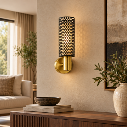 Vesper black honeycomb and brushed-gold LED wall light in a warm contemporary living room