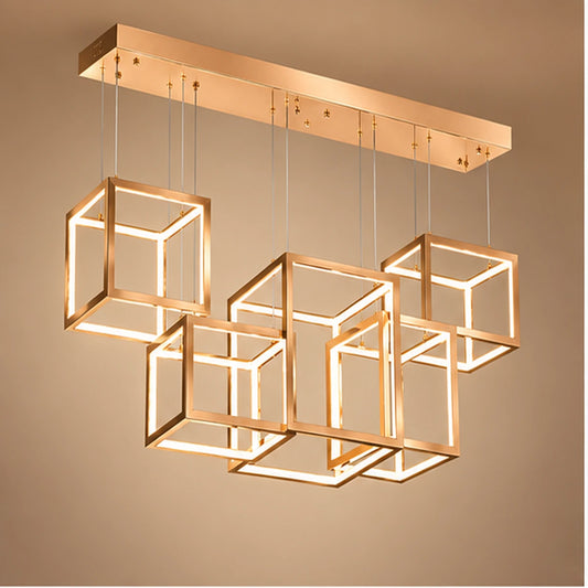 Champagne gold six-cube linear pendant on warm white