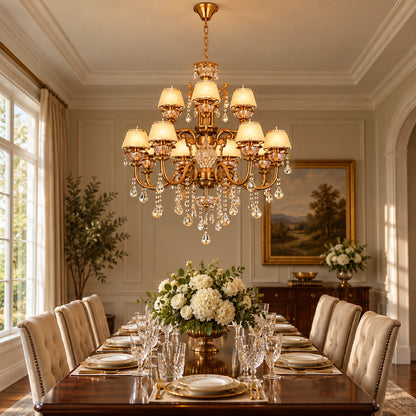 Two-tier antique gold crystal chandelier above a formal dining table