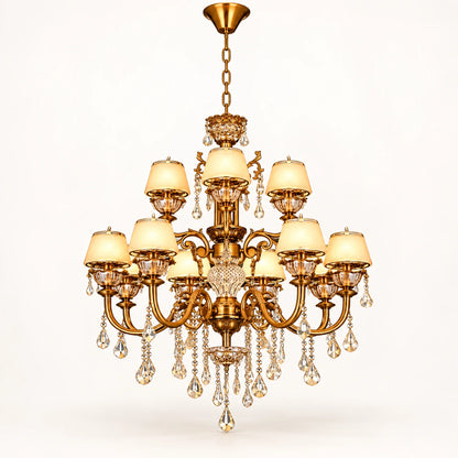 Two-tier antique gold crystal chandelier on a warm-white background