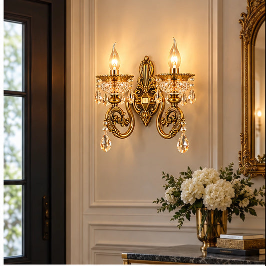 Two-arm crystal wall light in an entryway