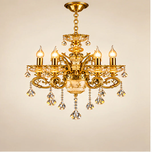 Antique gold six-arm crystal chandelier on a warm-white background