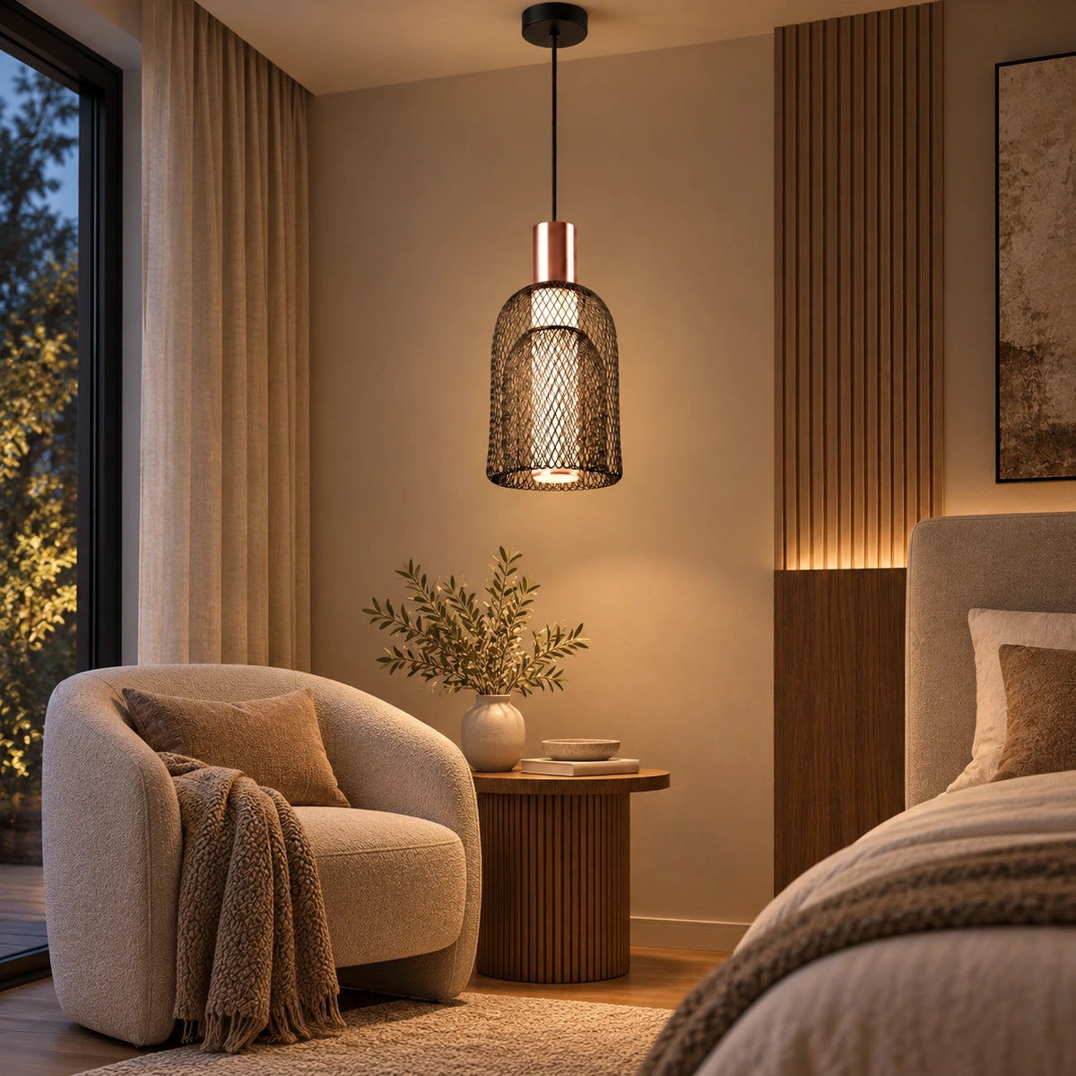 Nested black mesh pendant light in a bedroom seating corner