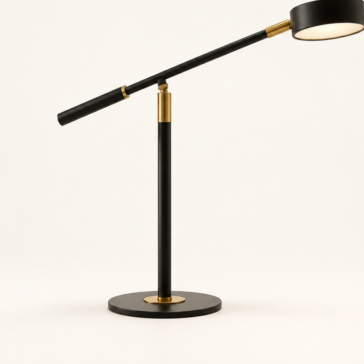 Close-up of the Axis task lamp pivot, upright stem and circular base