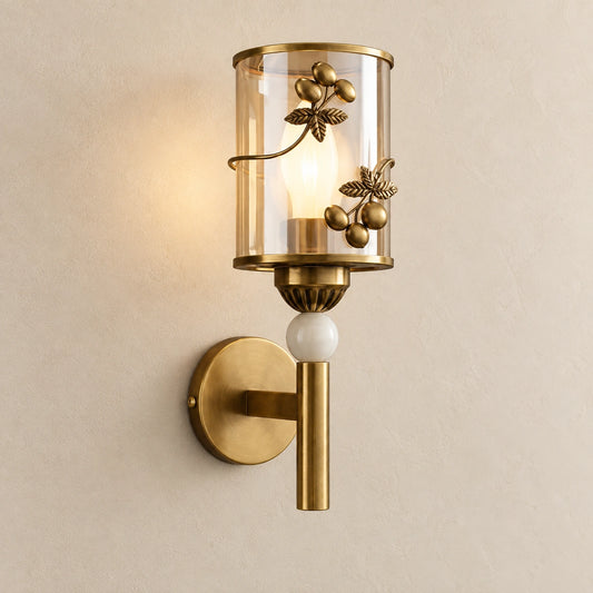 Botanical cylinder wall sconce on a warm studio wall