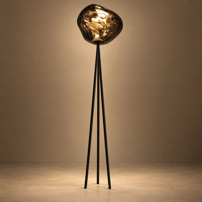 Smoke globe tripod floor lamp on a warm studio background