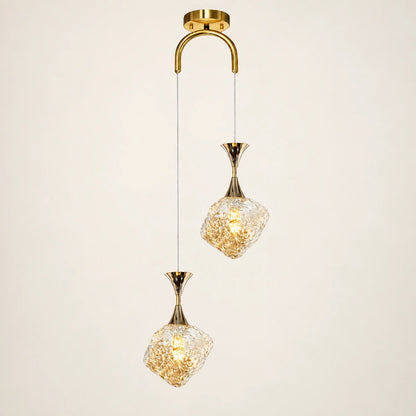 Textured-glass two-light pendant on a warm studio background
