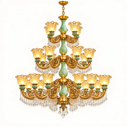 Grand three-tier gold-tone chandelier with green glass accents and crystal drops