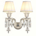 Illustration of crystal accent double-shade wall sconce; scale, light output and weather-exposure suitability unverified