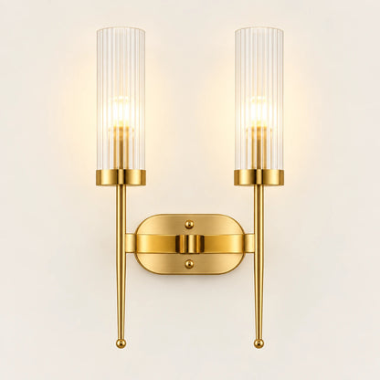 Twin ribbed glass cylinder wall sconce with brass-tone mount
